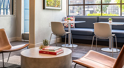 Lobby at Signature Hotel San Francisco. Seating for continental breakfast in the mornings or relaxing in the afternoon and evenings.